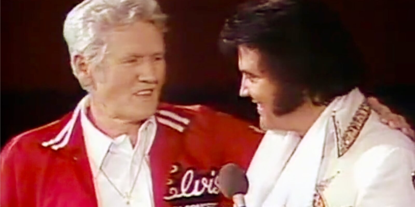Vernon and Elvis Presley onstage in a frame grab from CBS' 'Elvis in Concert.'