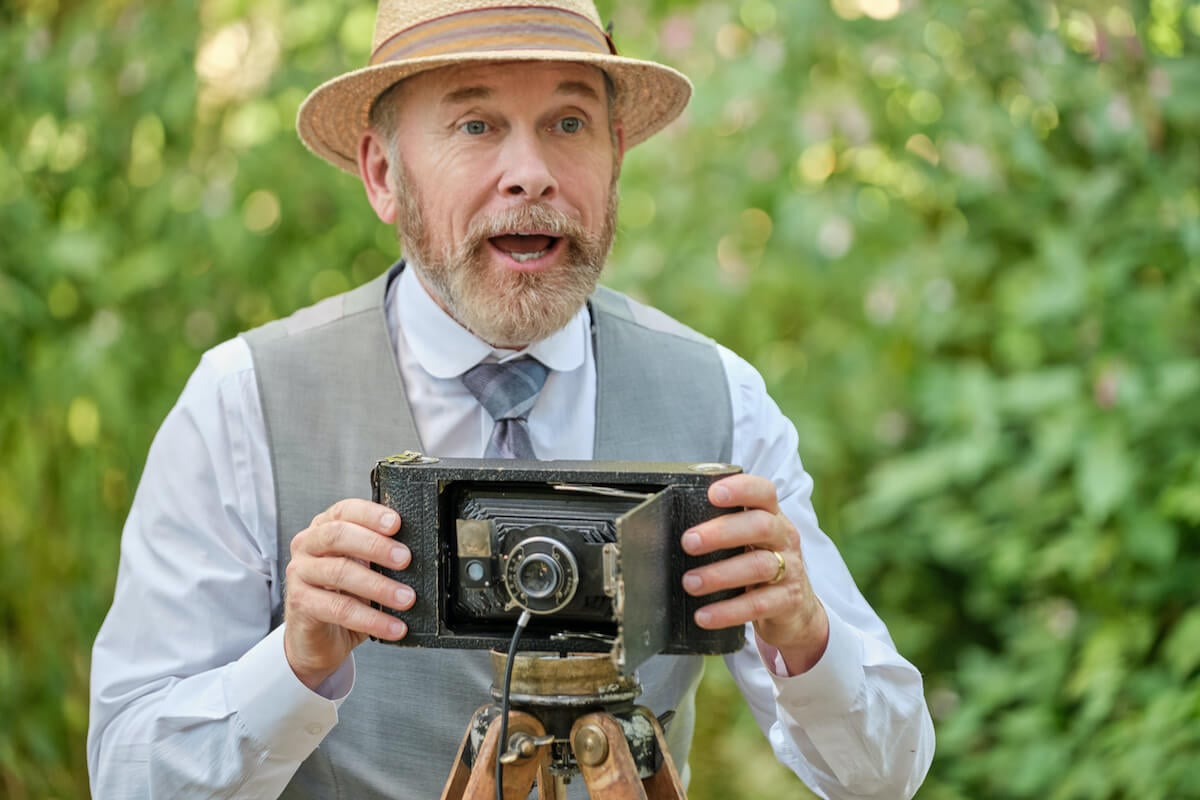 Ned taking a photo with an old-timey camera in 'When Calls the Heart' Season 10 Episode 2