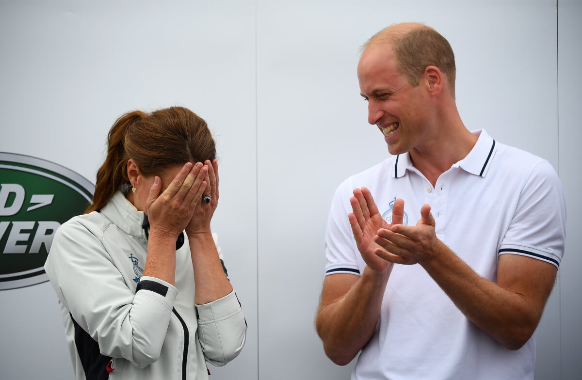 Kate Middleton competing on behalf of The Royal Foundation is presented the Wooden Spoon at the inaugural King’s Cup regatta much to the amusement of Prince William, Duke of Cambridge hosted by the Duke and Duchess of Cambridge ahead of Cowes SailGP on August 09, 2019 in Cowes, England