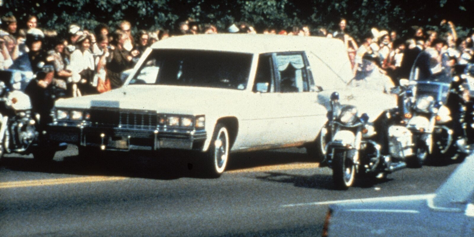 Elvis Presley's funeral hearse was a white Cadillac that transported his body from Graceland to Forest Hill Cemetary in Memphis, TN.