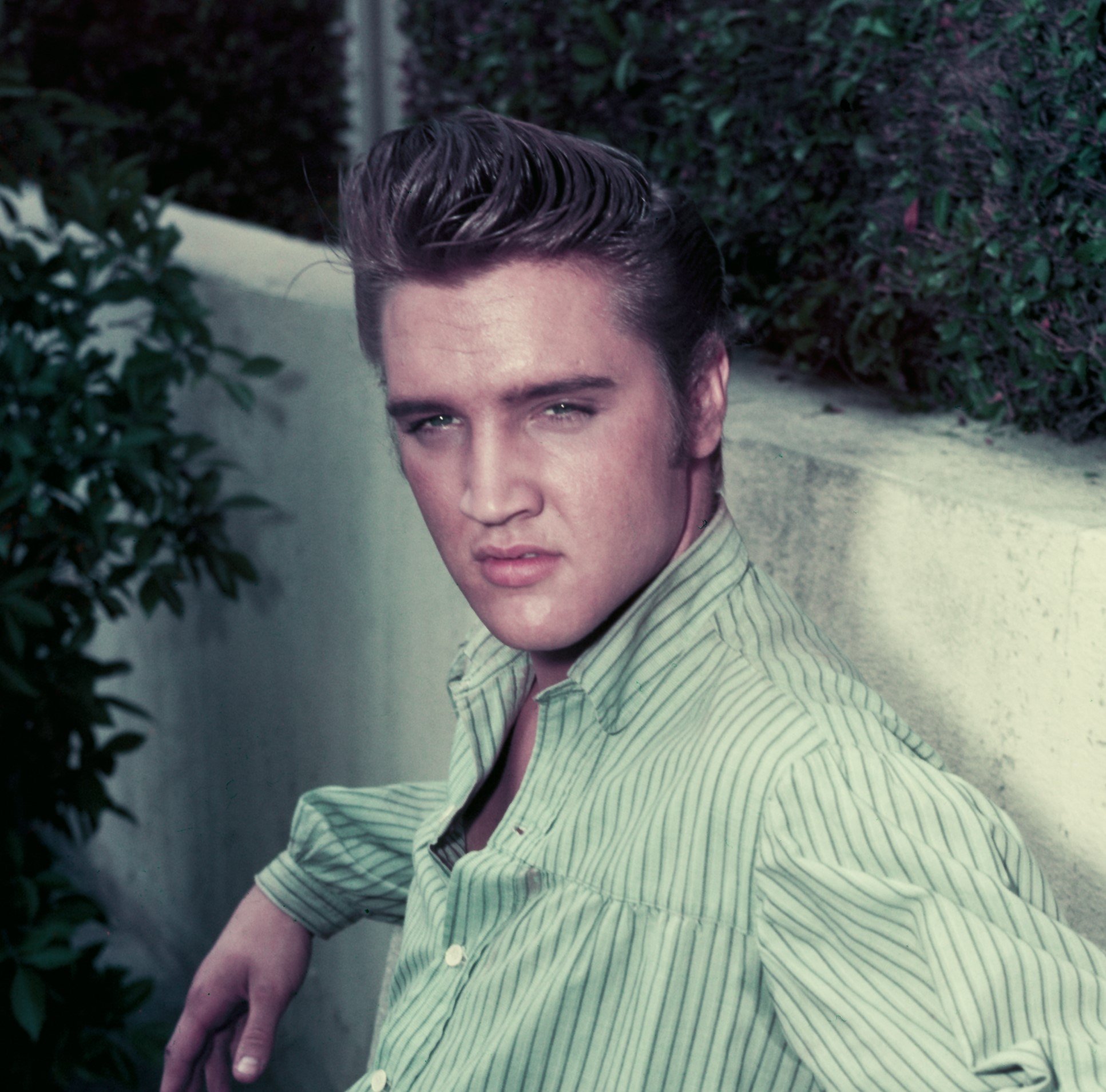 Elvis Presley wearing green