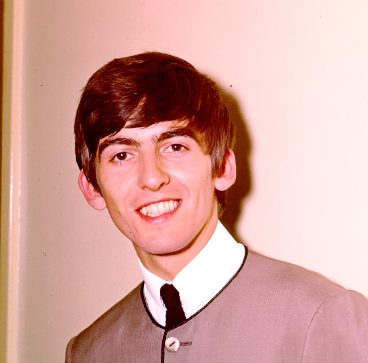 "Got My Mind Set on You" singer George Harrison smiling