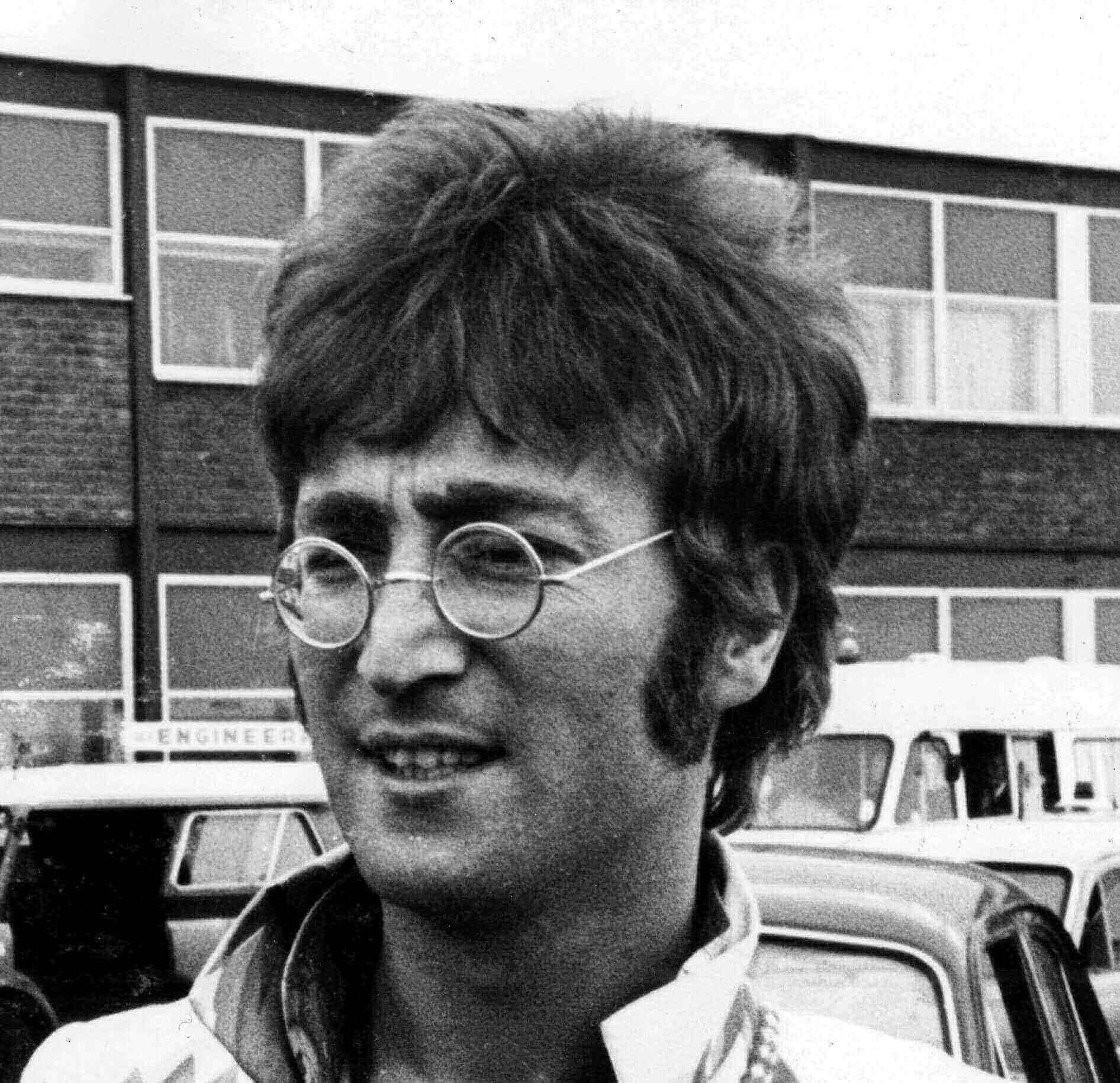 John Lennon wearing glasses