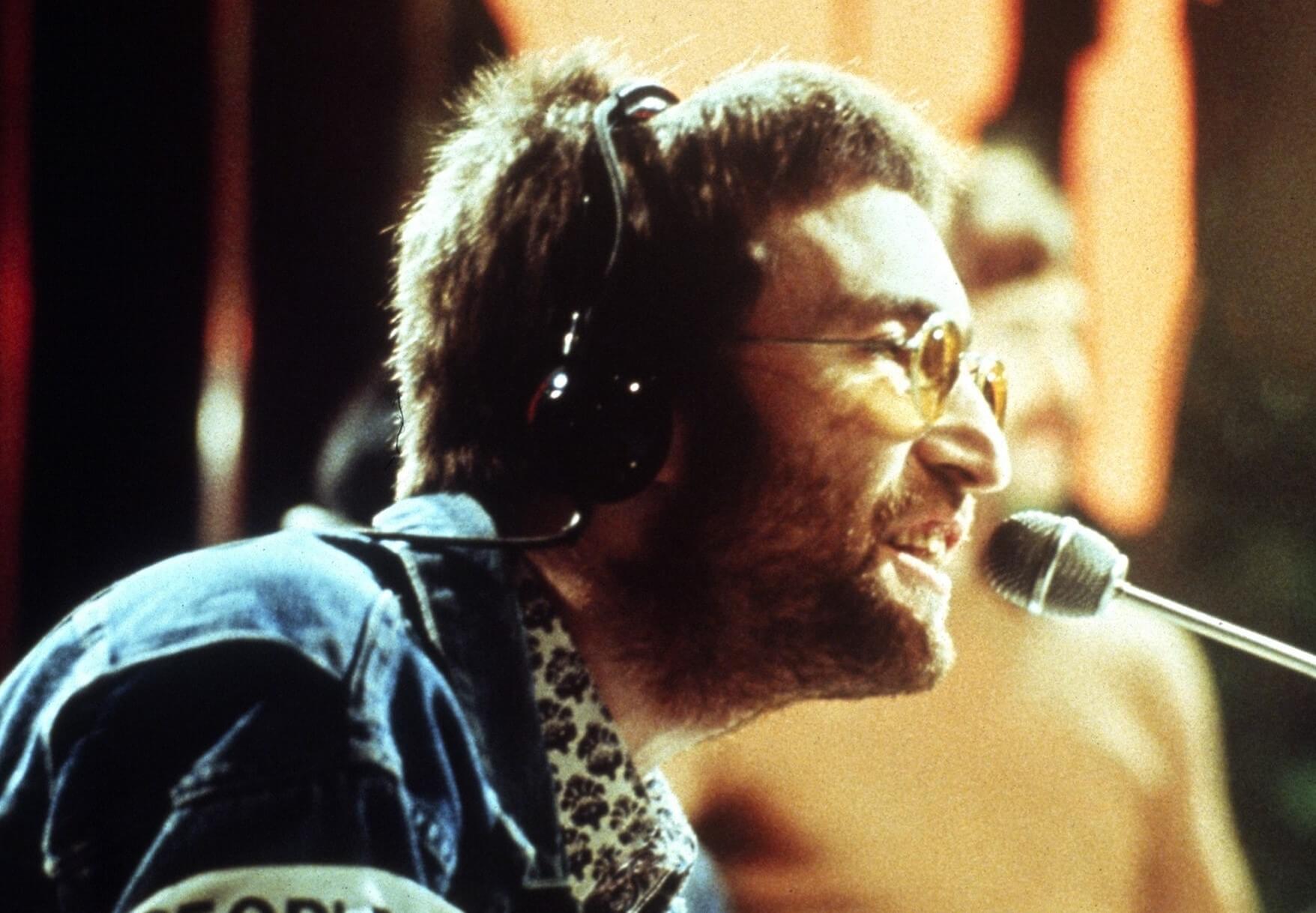 "Imagine" singer John Lennon with a microphone