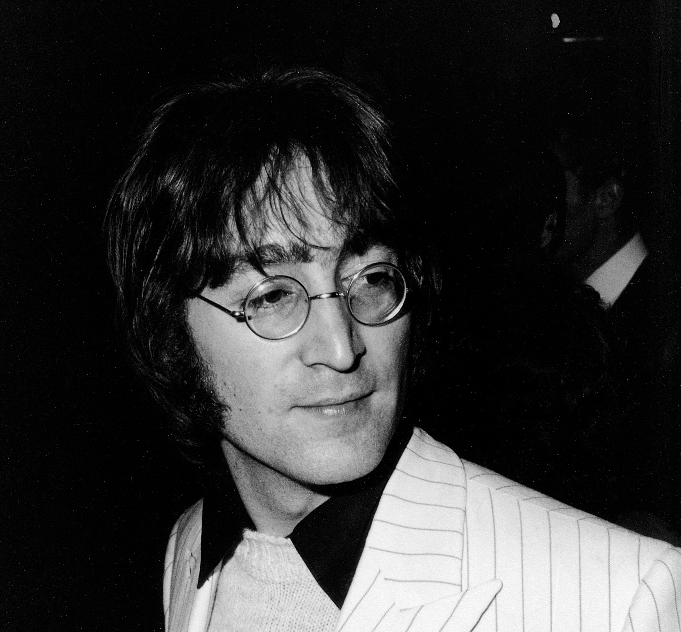 John Lennon in a suit