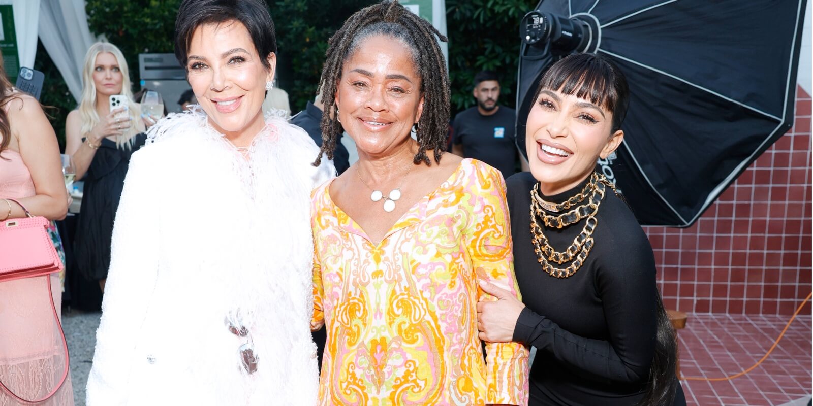 Kris Jenner, Doria Ragland, and Kim Kardashian at a charity event in August 2023.