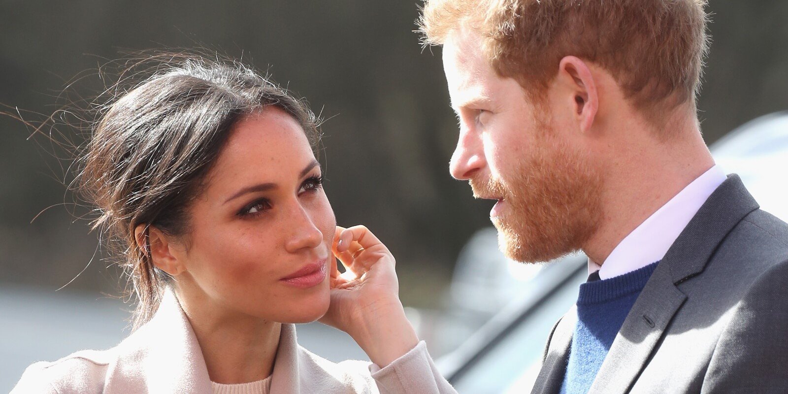 Meghan Markle looks at Prince Harry on March 23, 2018 in Lisburn, Nothern Ireland.