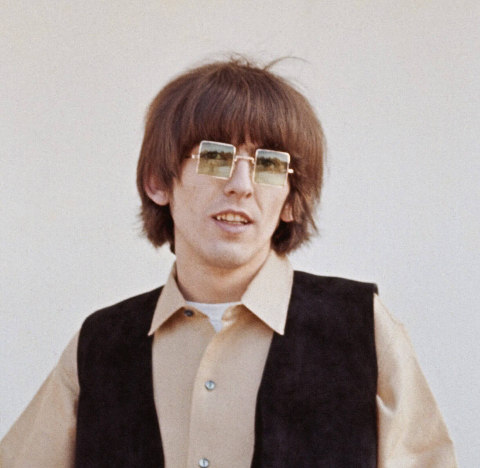 George Harrison, the inspiration for Oasis' "Wonderwall," wearing a vest
