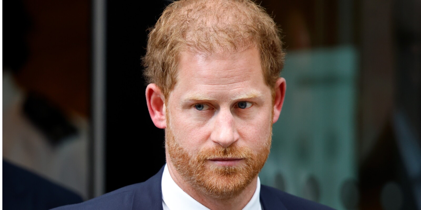 Prince Harry's hair has come under fire after a new photograph shows him with darker and fuller locks.