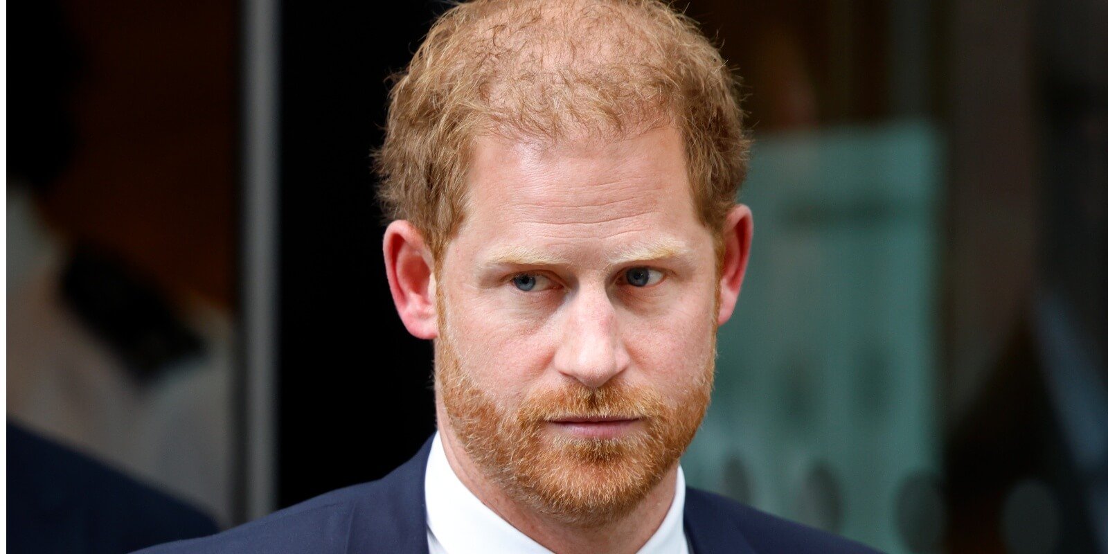 Prince Harry's hair has come under fire after a new photograph shows him with darker and fuller locks.