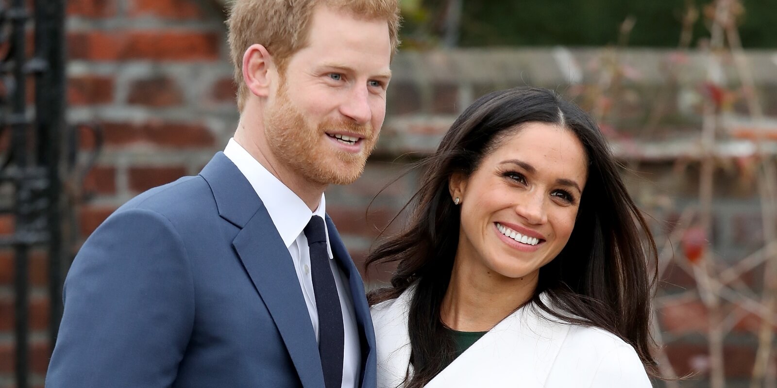Prince Harry and Meghan Markle pose for photographers during their engagement announcement in 2017.