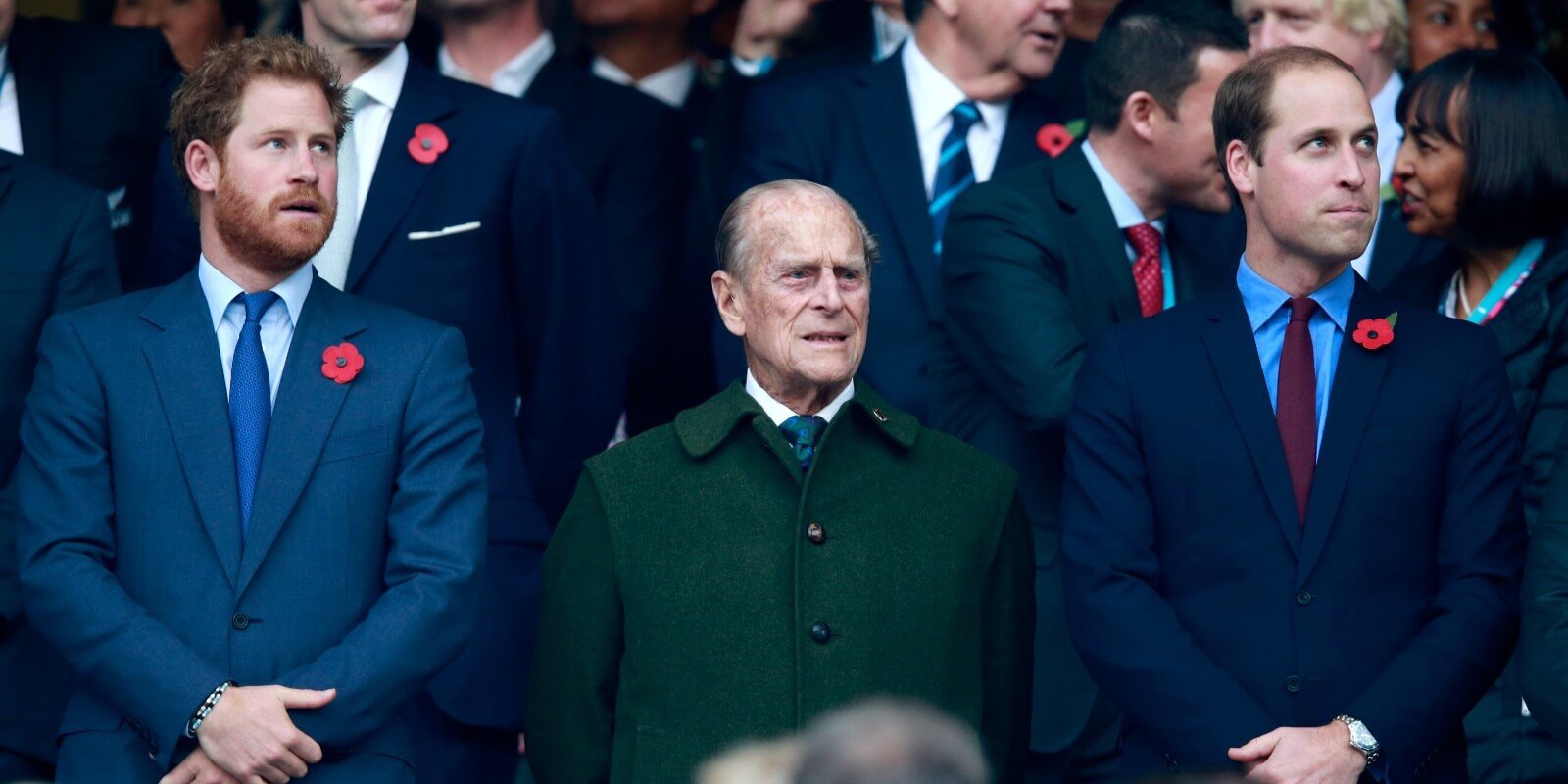 Prince Harry, Prince Philip and Prince William pose together during the 2015 Rugby World Cup Final match between New Zealand and Australia.