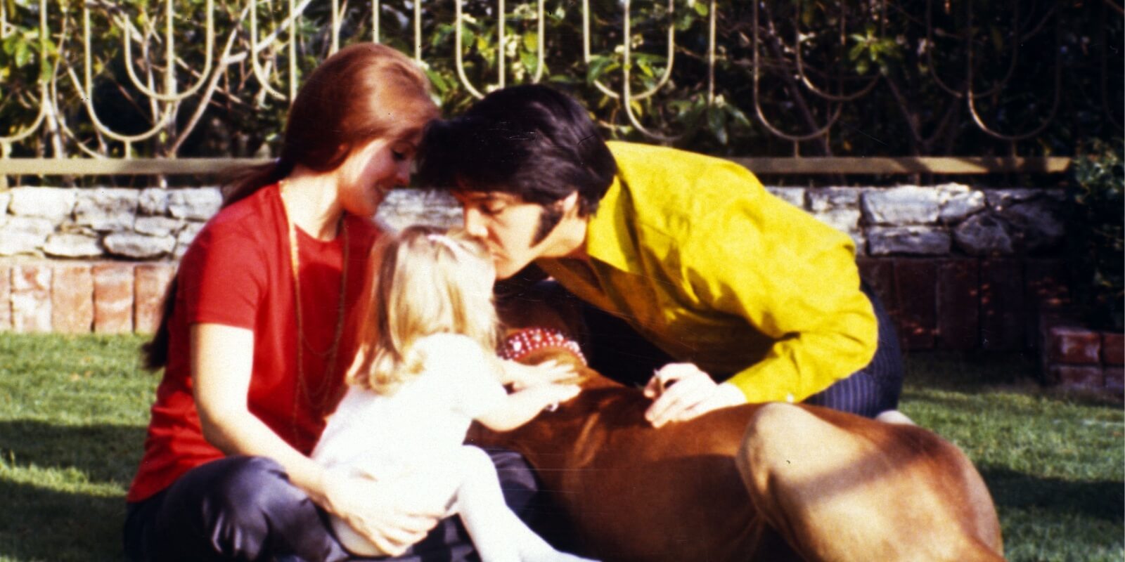 Priscilla, Lisa Marie, and Elvis Presley pictured at Graceland.