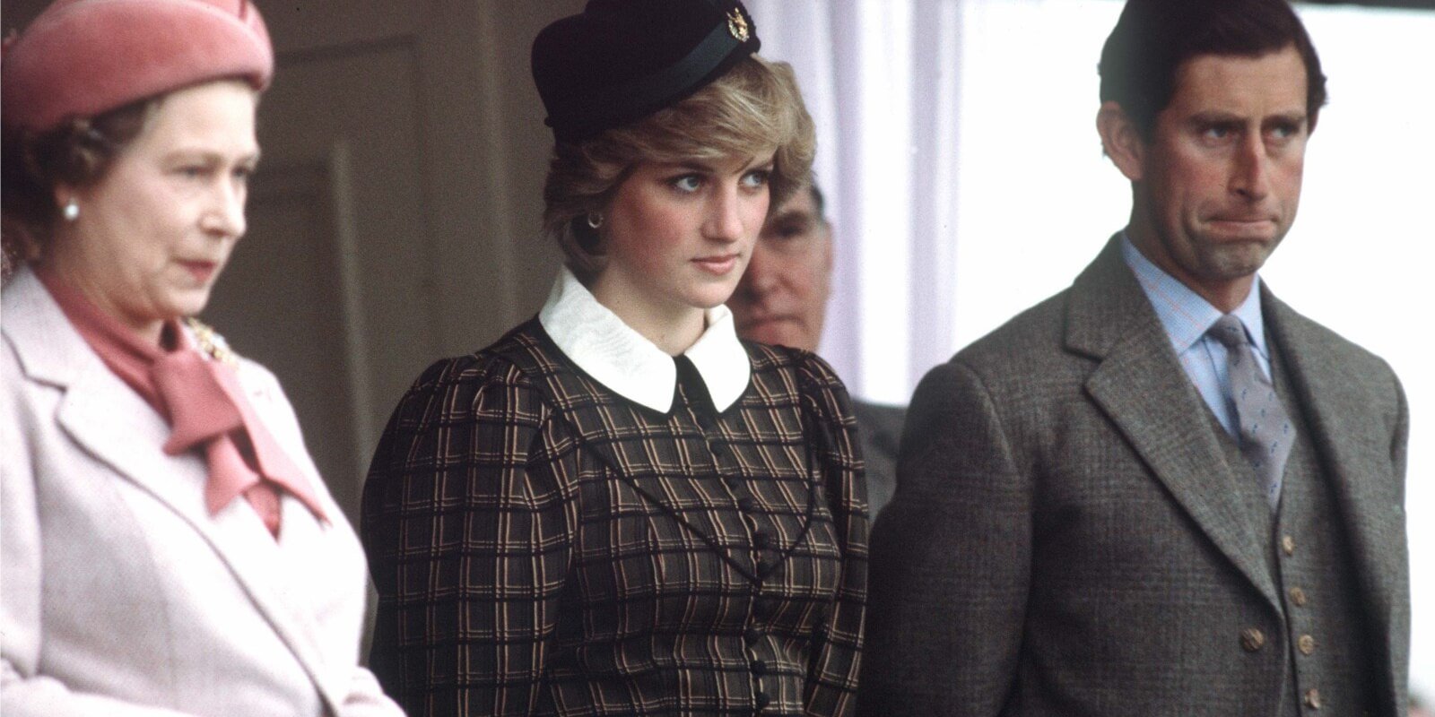 Queen Elizabeth, Princess Diana and King Charles watching the Highland Games at Braemar.