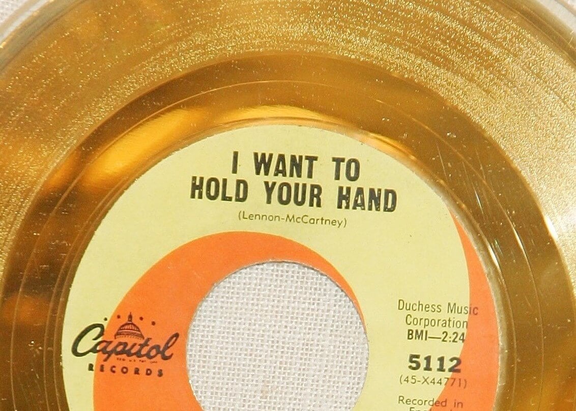 A vinyl of The Beatles' "I Want to Hold Your Hand"
