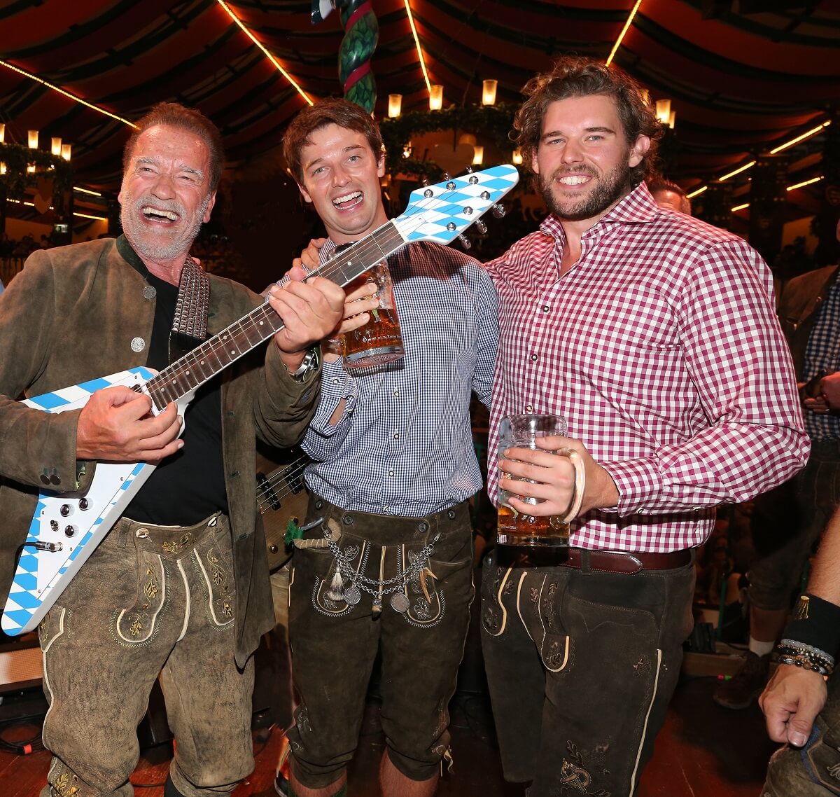 Arnold Schwarzenegger with sons Patrick Schwarzenegger and Christopher Schwarzenegger celebrating the 187th Oktoberfest