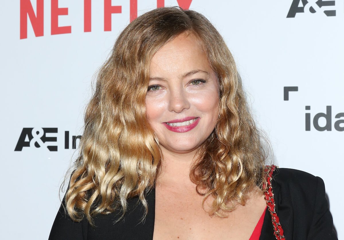 Smiling Bijou Phillips with wavy hair