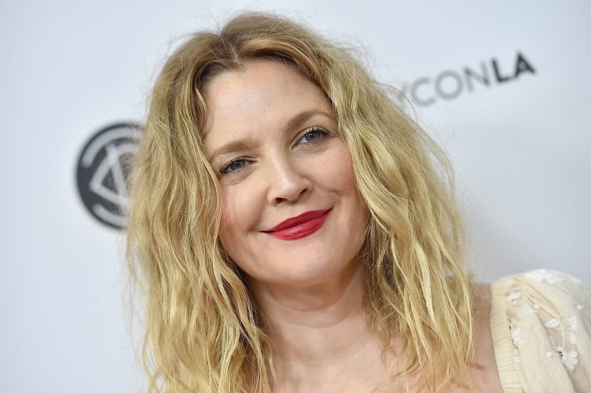 Drew Barrymore smiling at the Beautycon Festival LA 2018 at Los Angeles Convention Center.