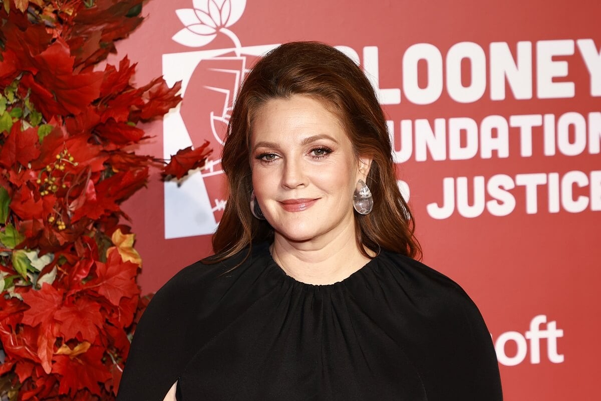 Drew Barrymore smiling at the Clooney Foundation For Justice Inaugural Albie Awards.