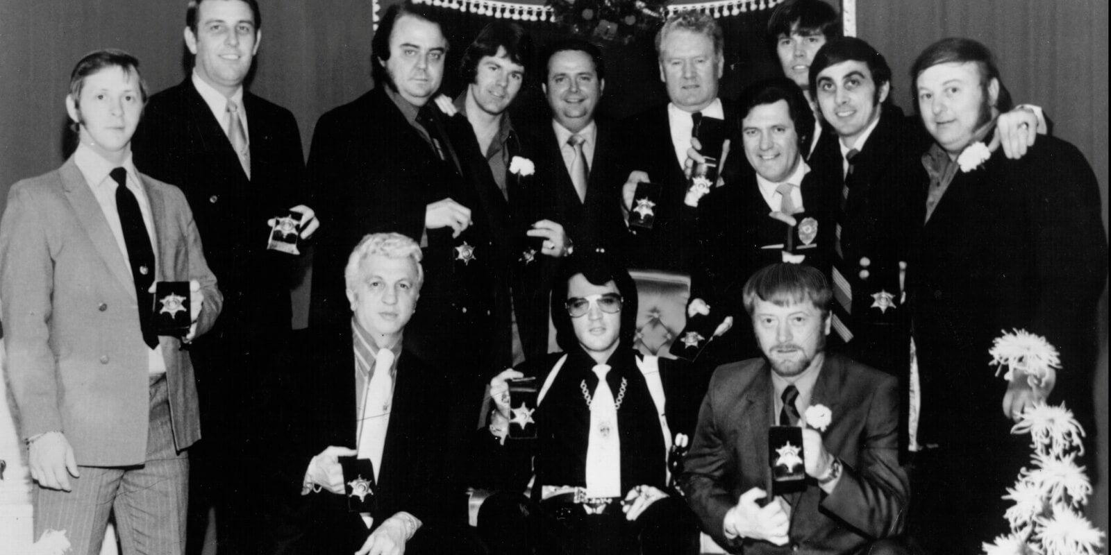 Elvis Presley surrounded by his close friends and family dubbed the 'Memphis Mafia.'