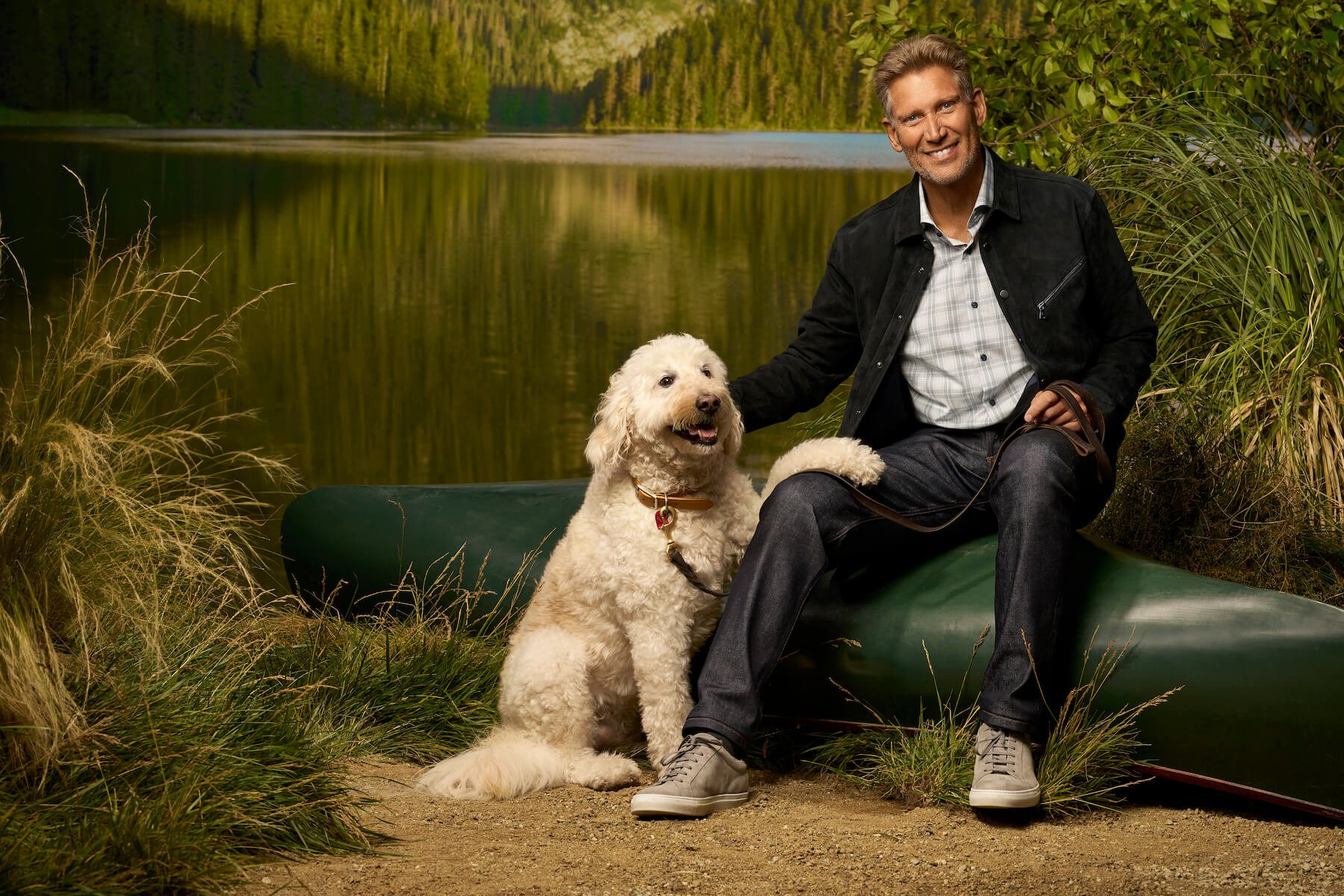 'The Golden Bachelor' star Gerry Turner sitting with his dog outdoors