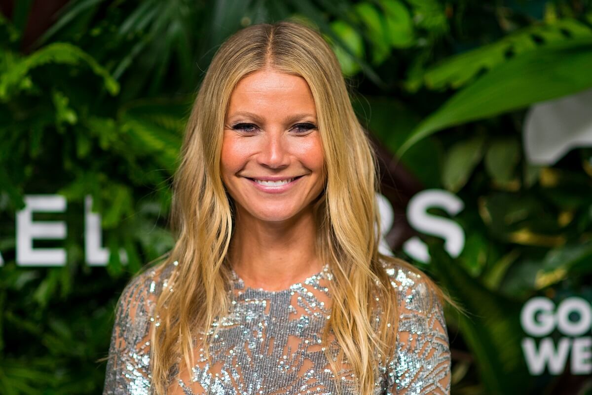 Gwyneth Paltrow posing in a silver dress at the the 11th Annual God's Love We Deliver Golden Heart Awards.
