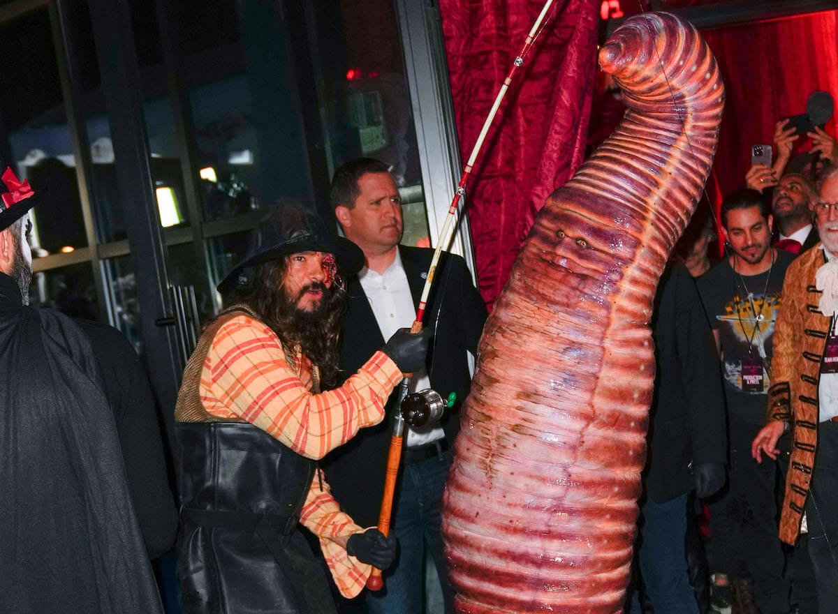 Heidi Klum in her 2022 Hallowene costume, a worm, with husband Tom Kaulitz