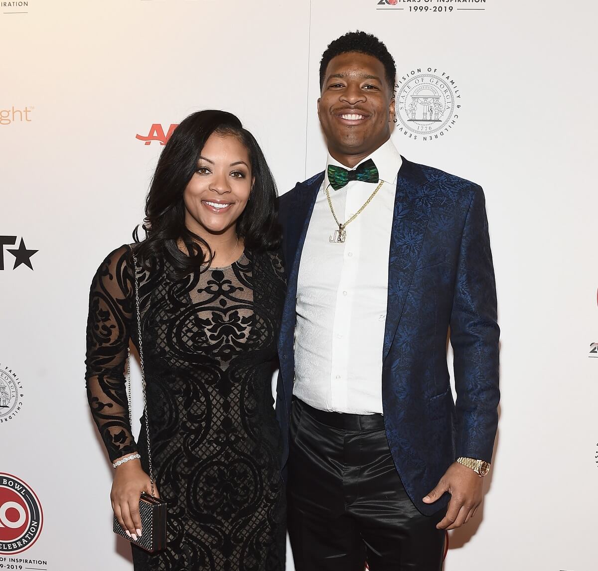 Jameis Winston and partner Breion Allen pose on the red carpet at Super Bowl Gospel Celebration in Atlanta