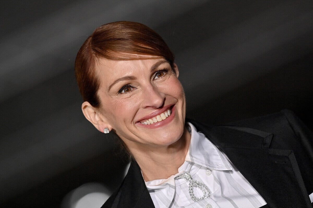 Julia Roberts smiling in a black and white outfit at the 2nd Annual Academy Museum Gala.