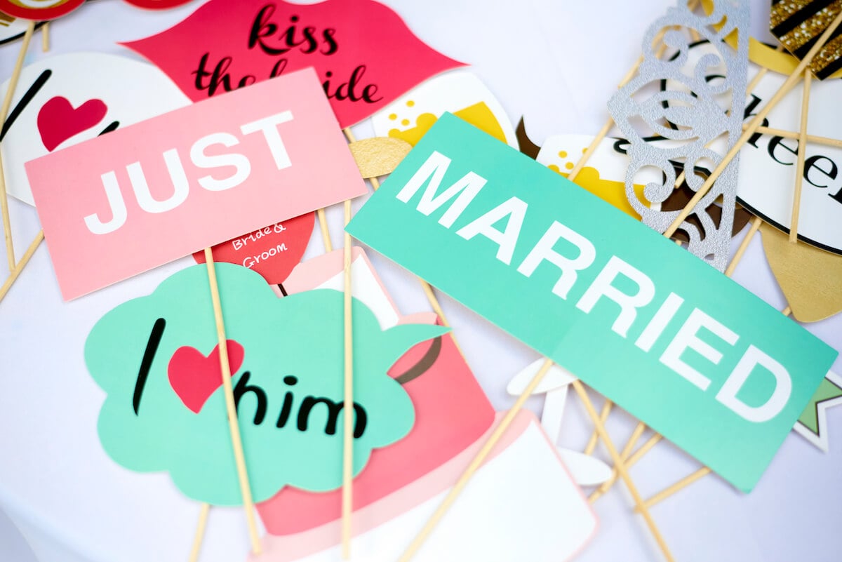 Just married signs on a white background promoting 'Married at First Sight'