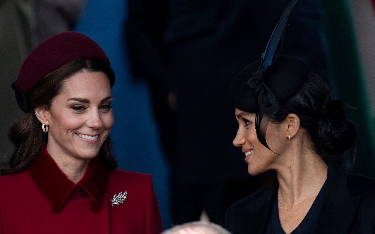 Kate Middleton and Meghan Markle, who a body language expert says adopted a 'nervous gesture' from her sister-in-law, attend Christmas Day Church service