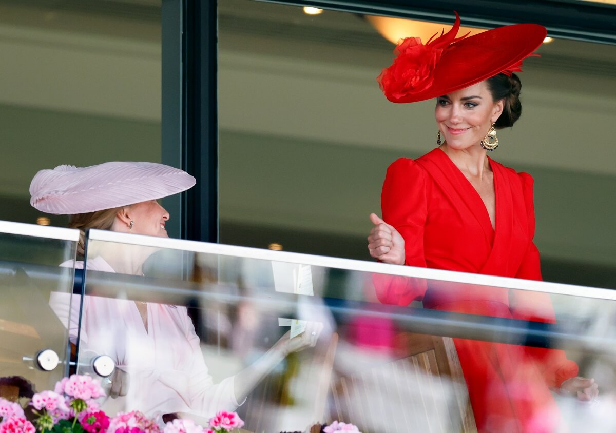 Kate Middleton gives Duchess Sophie a thumbs up as they watch the racing on Day 4 of the Royal Ascot 2023