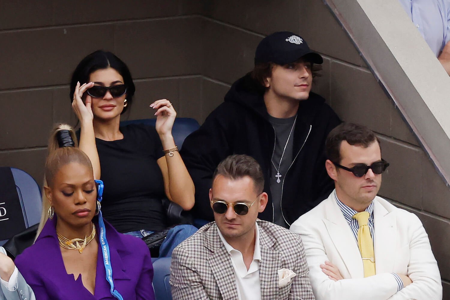 Kylie Jenner from 'The Kardashians' Season 4 kissing Timothée Chalamet while sitting at the 2023 US Open Tennis Championships