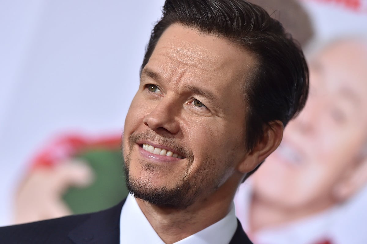 Mark Wahlberg posing in a suit at the premiere of 'Daddy's Home 2'.