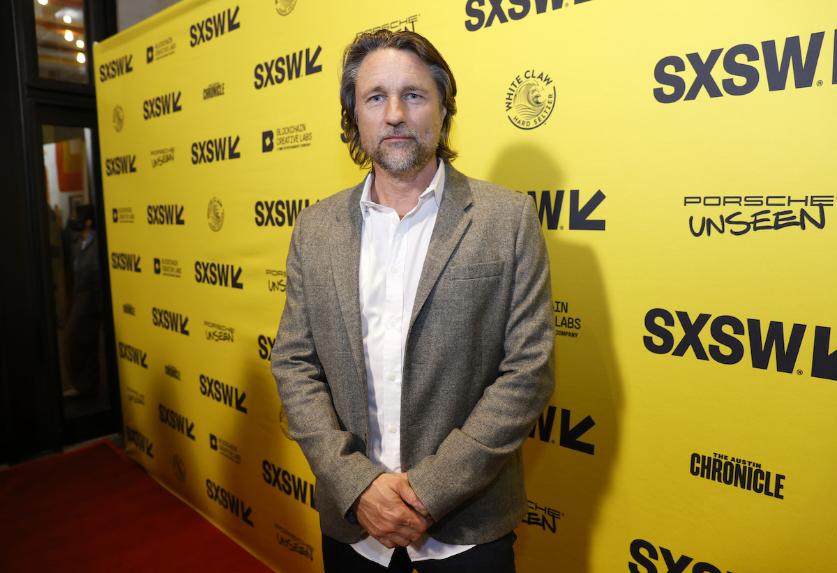 'Virgin River' Season 5 actor Martin Henderson posing for a photo at an event in 2022 