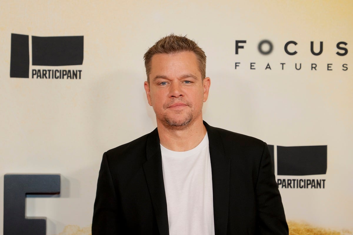 Matt Damon posing in a blazer at the premiere of 'Stillwater'.