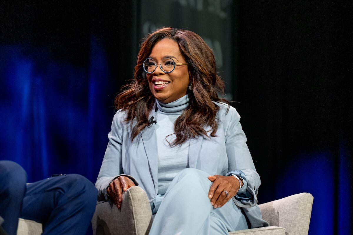 Oprah Winfrey, who called asking Sally Field about Burt Reynolds' toupee an 'awful question,' smiles