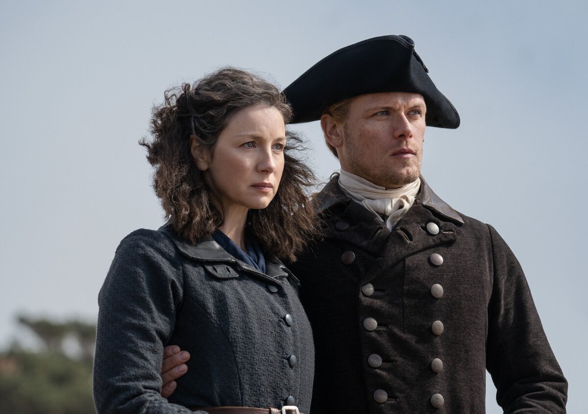 Outlander stars Caitriona Balfe and Sam Heughan as Jamie and Claire Fraser in an image from season 7