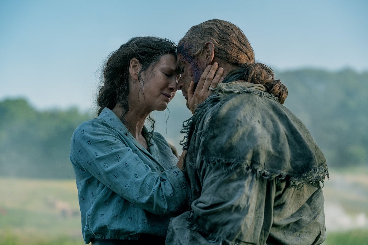 Claire holding Jamie's face in 'Outlander' Season 7