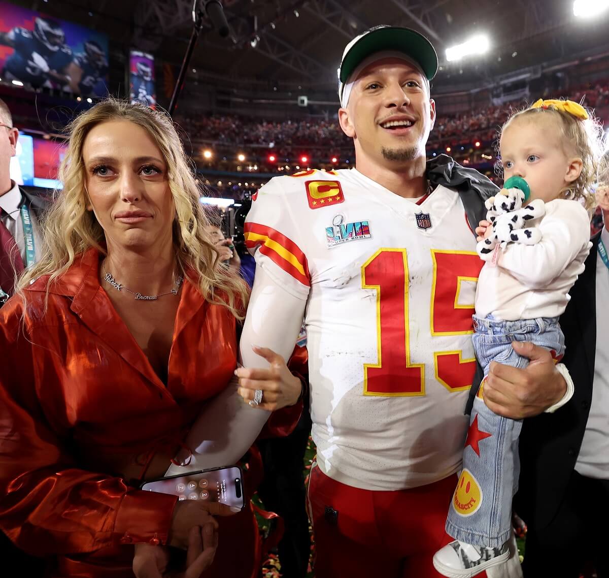 Patrick Mahomes, Brittany Mahomes and daughter Sterling Mahomes following the Kansas City Chiefs victory in Super Bowl LVII