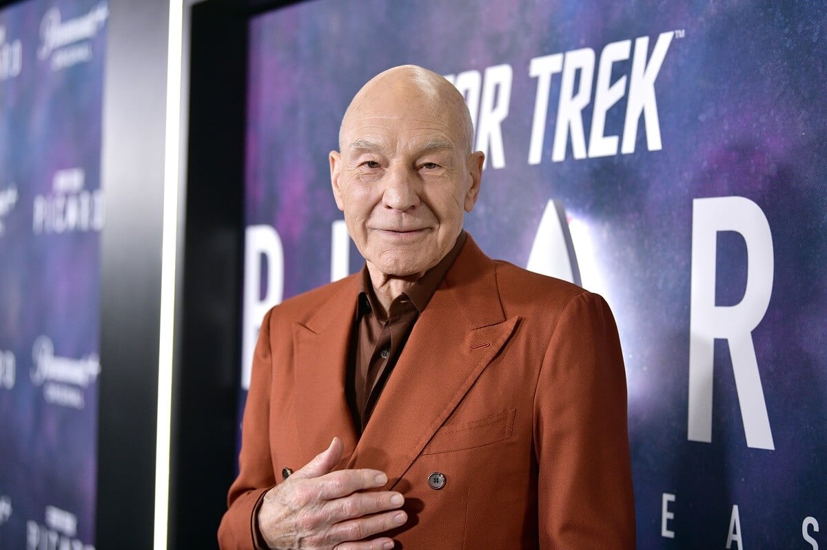 Patrick Stewart posing in a brown suit at the the “Picard” season 3 premiere.