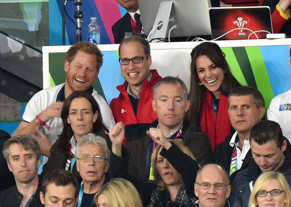 Prince Harry, Prince William, and Kate Middleton enjoy a rugby game in 2015
