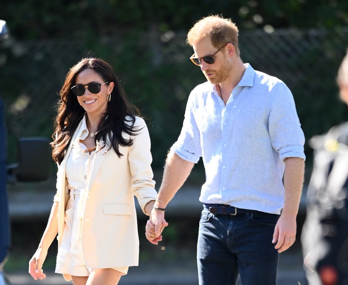 Prince Harry and Meghan Markle attend the cycling medal ceremony during Day 6 of the Invictus Games Düsseldorf 2023