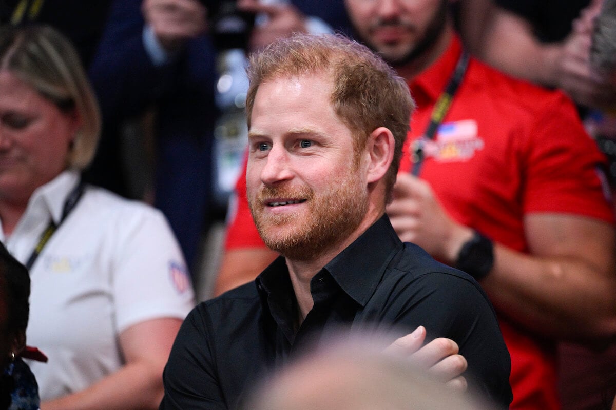 Prince Harry, who made a 'double-edged' comment after 'stepping back' statement, per 'Spare,' looks on