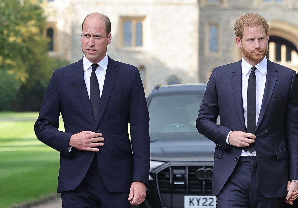 Prince William and Prince Harry, who might expect to get a 'text' or 'email' on his birthday from his brother, on the long Walk at Windsor Castle arrive to view flowers and tributes to Queen Elizabeth