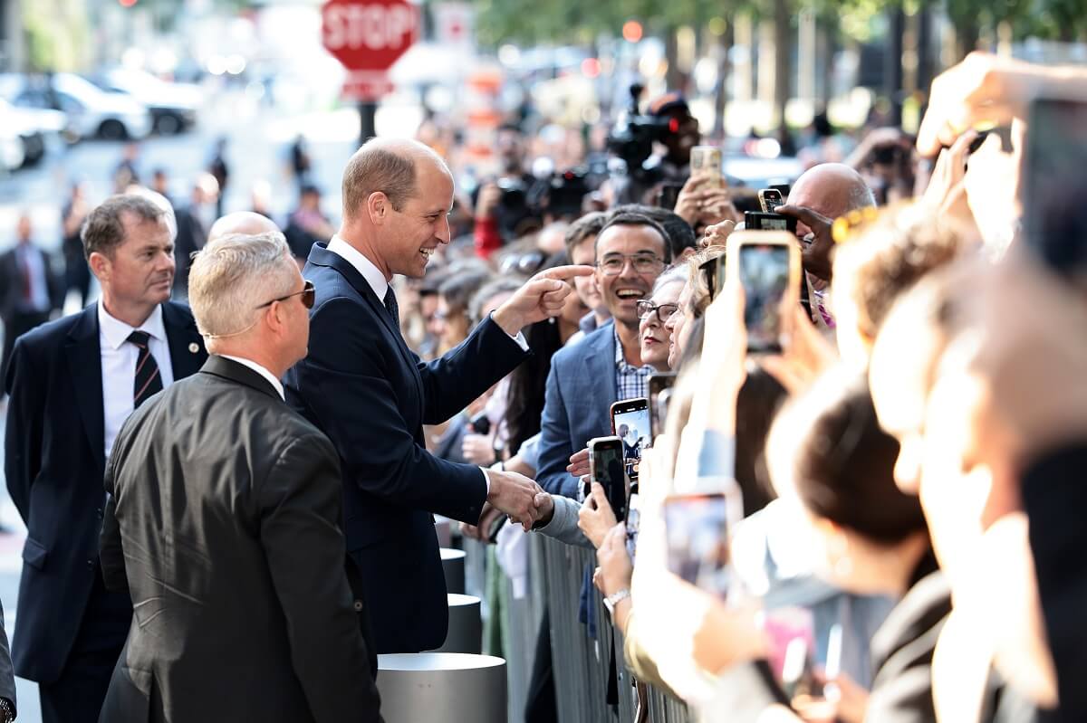 Prince William greets fans as he visits a FDNY Firehouse