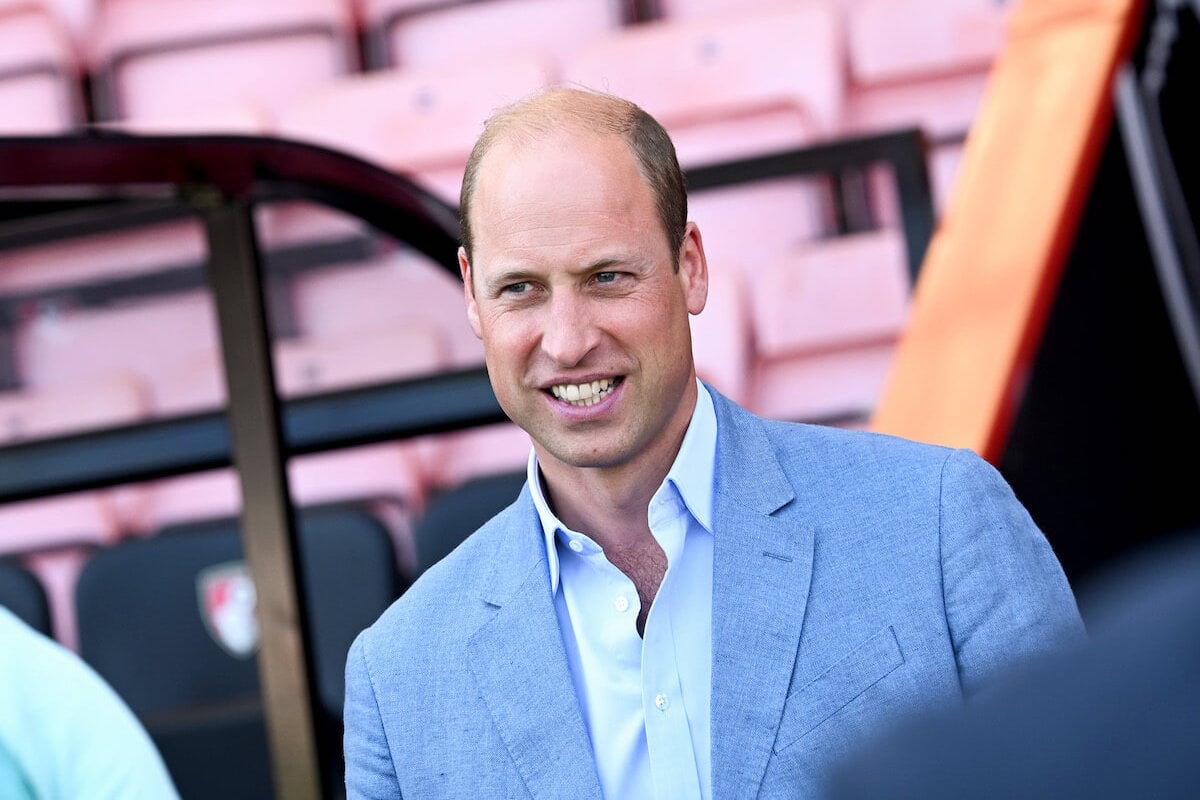 Prince William, whose Earthshot Prize Awards are his 'make-or-break' legacy, per a commentator, looks on wearing a blue blazer