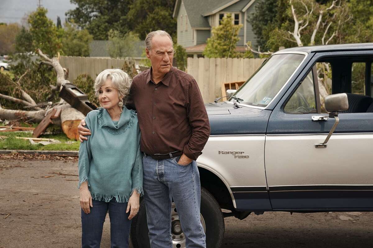 MeeMaw and Dale Ballard stand together after the tornado in an episode of 'Young Sheldon'
