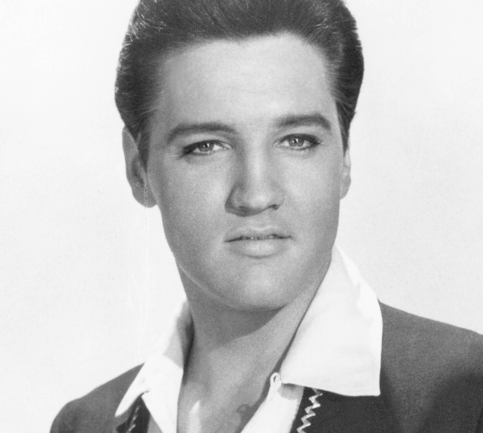 "Bossa Nova Baby" singer Elvis Presley in black-and-white