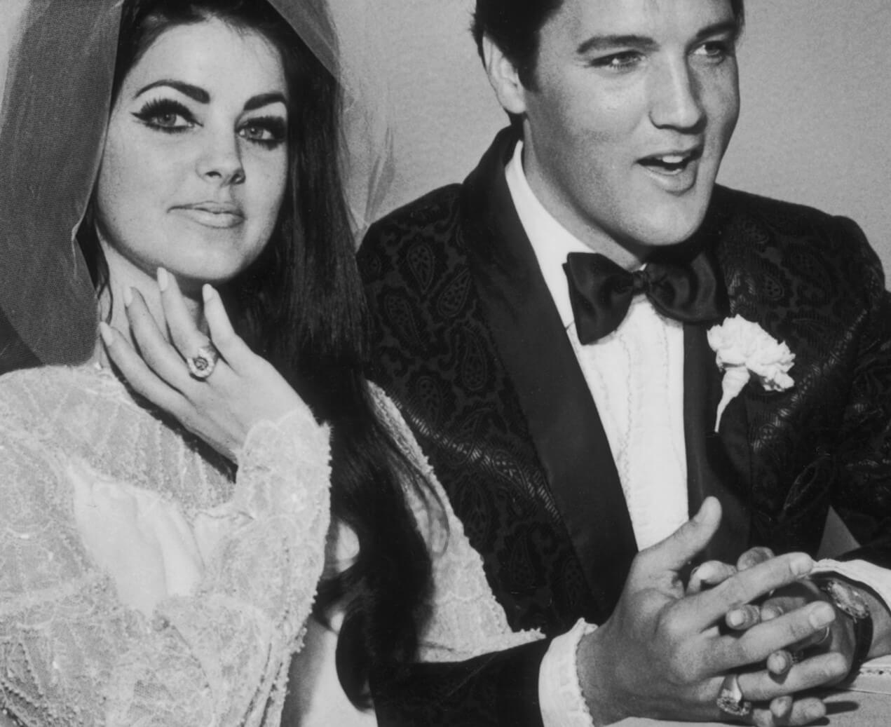 Priscilla Presley and "If I Can Dream" singer Elvis Presley in black-and-white